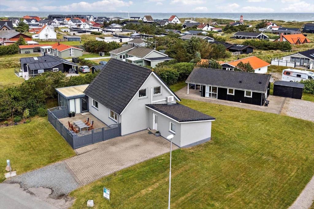 an aerial view of a house in a residential neighborhood at 1375-Thisted-Nordsovej-15 in Nørre Vorupør