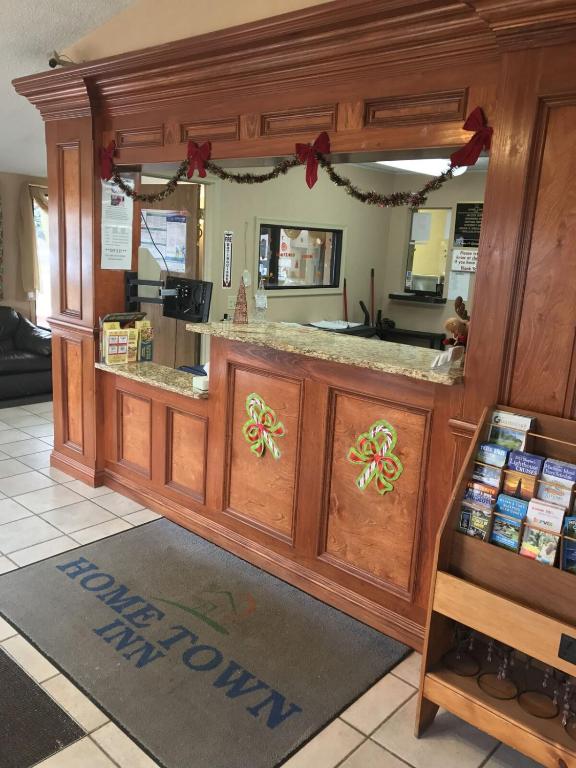 a food counter in a restaurant with red bows at Home Town Inn in Flint