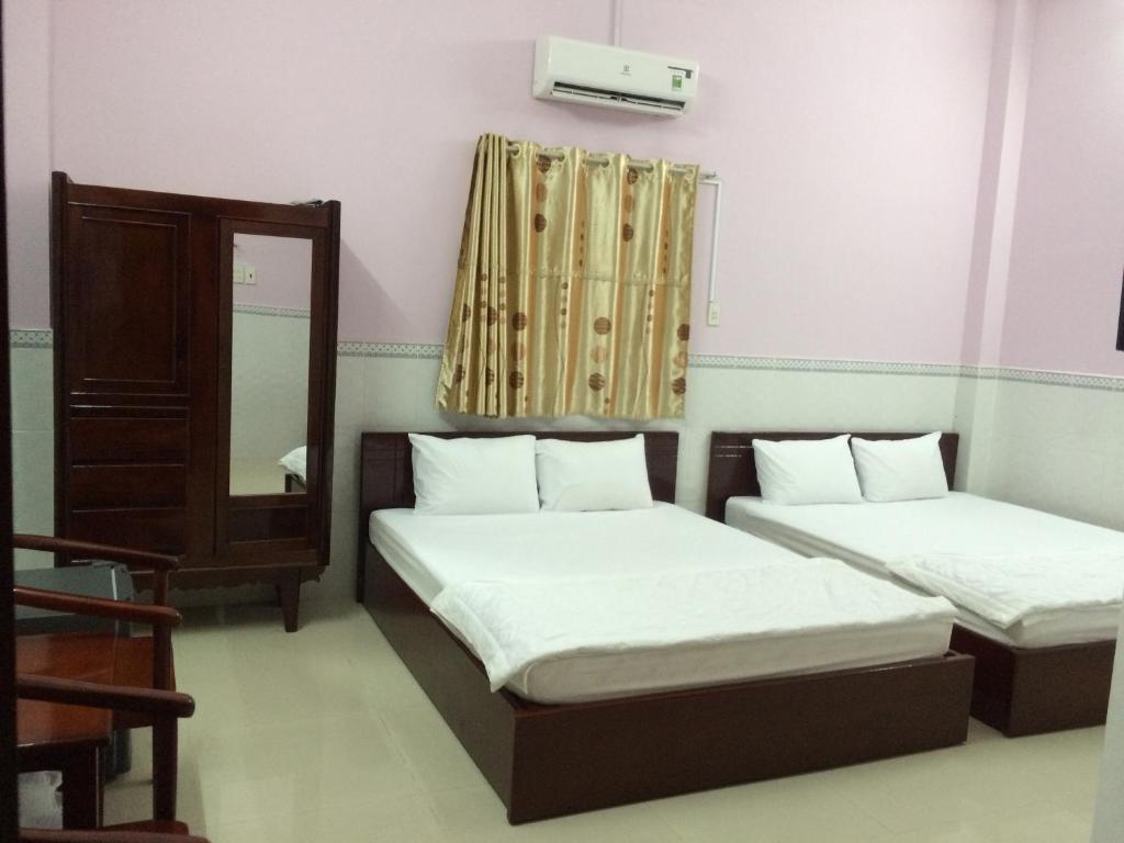Giường trong phòng chung tại Hostel Garnet