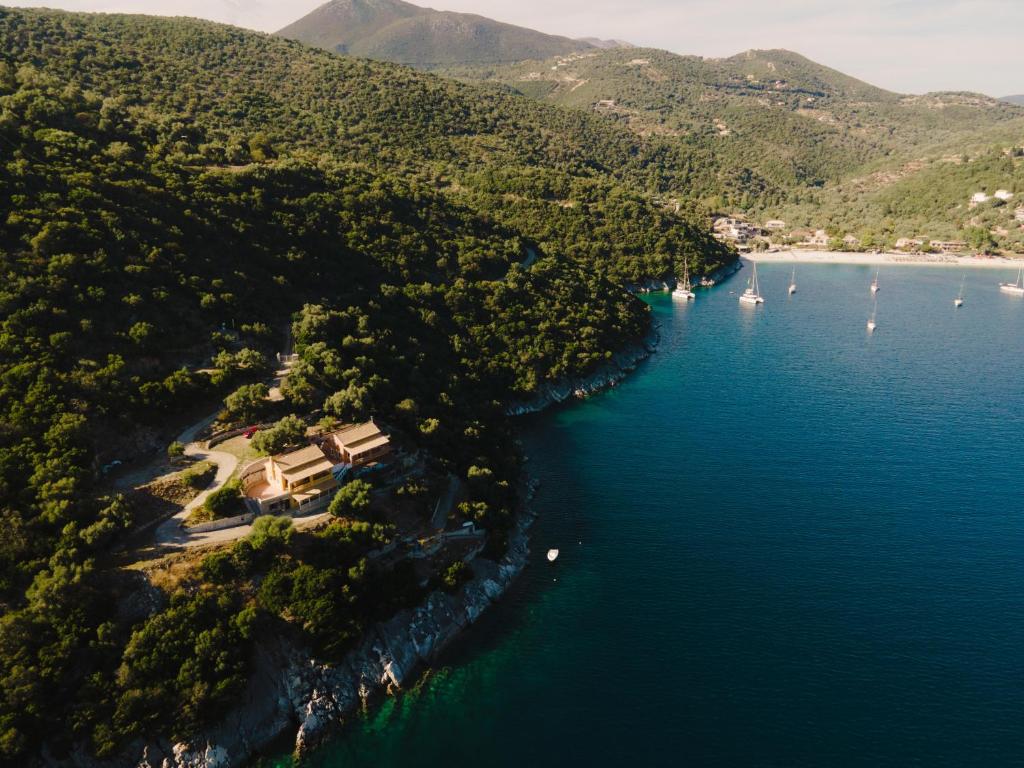 an aerial view of a lake with boats in the water at Yioka House in Mikros Gialos