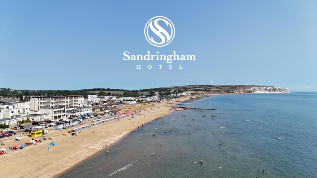 a view of a beach with people in the water at Sandringham Hotel - Seafront, Sandown, Isle of Wight - FREE CAR FERRY TICKET for 3 Nts, 1-2 Nts from 109 Pounds in Sandown