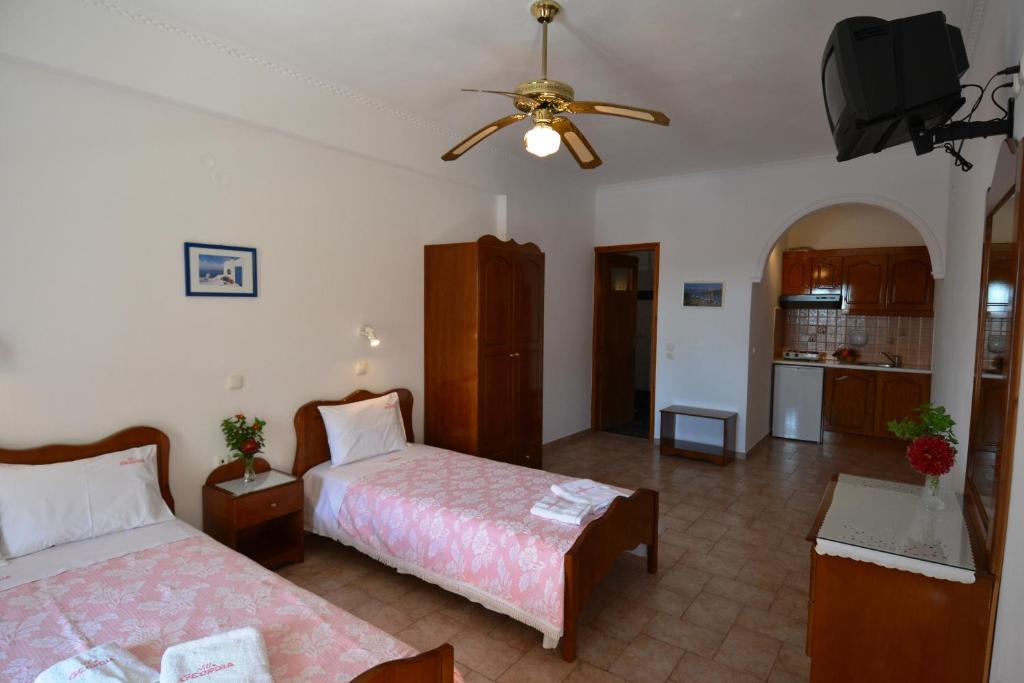 Postel nebo postele na pokoji v ubytování Villa Georgia