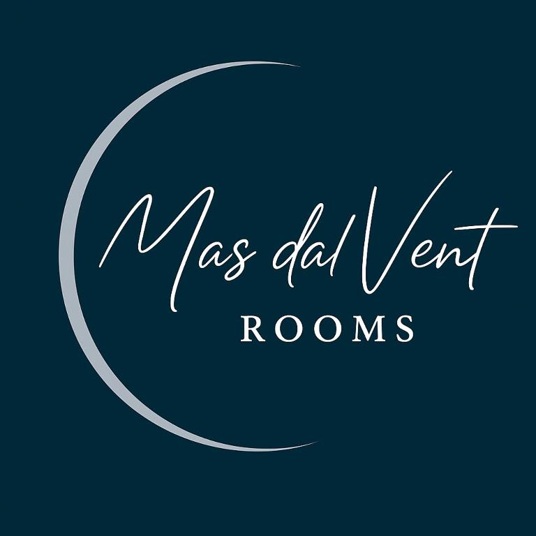 a sign that readsmass advent rooms with a circle at Mas dal Vent in Valfloriana