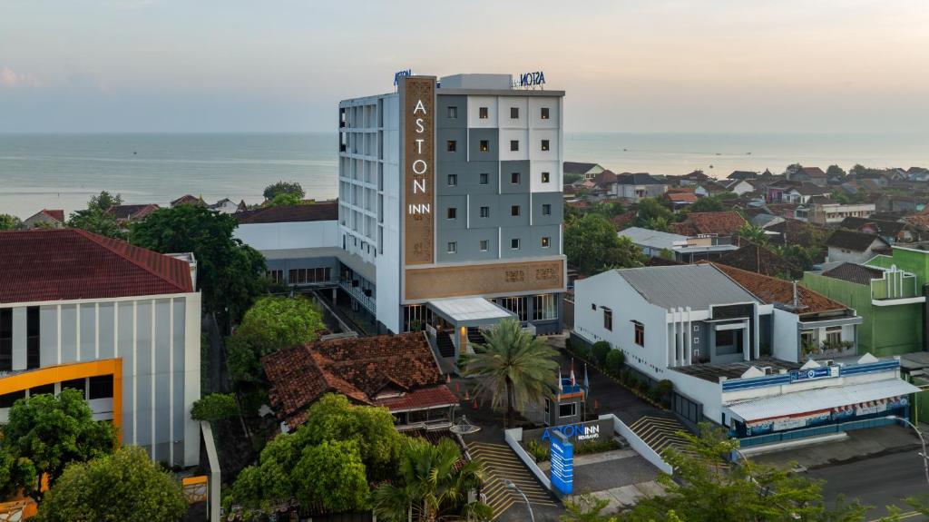 an overhead view of a city with a building at Aston Inn Rembang in Rembang