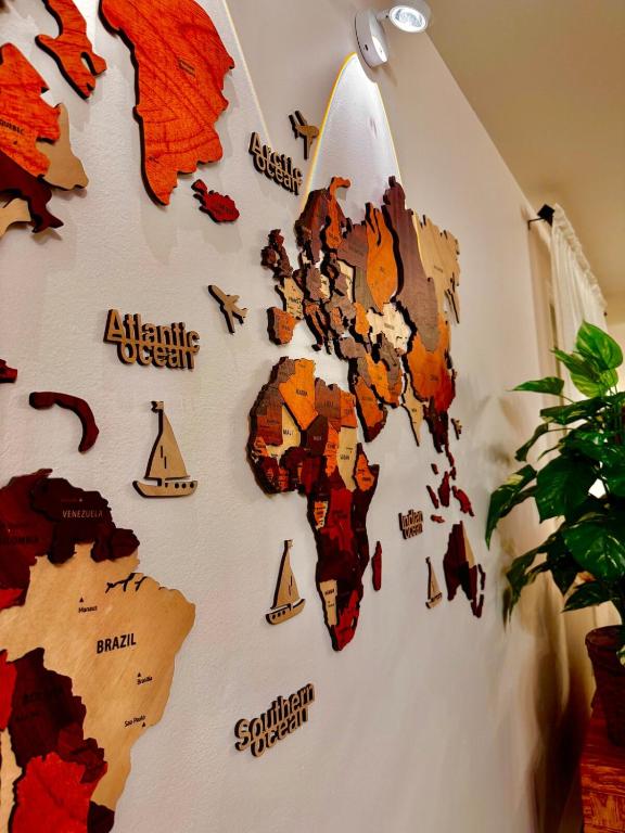 a wall with a map of the world on it at 2BR sweet suite in Nanaimo