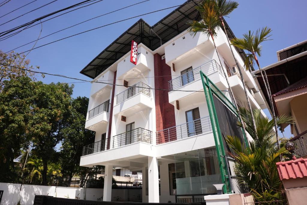 a view of the hotel from the street at Pearl Suites in Cochin