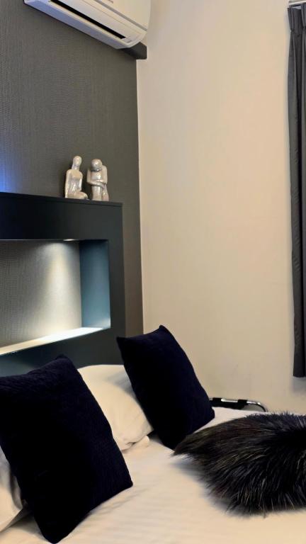 Postel nebo postele na pokoji v ubytování Belrom Hotel