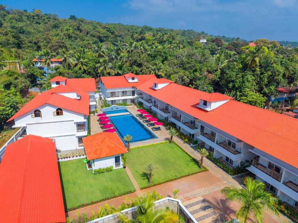 an aerial view of a house with an orange roof at River Deck Baga Beach Front in Calangute