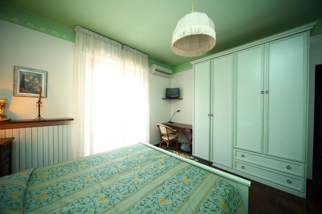 Postel nebo postele na pokoji v ubytování B&B Francesco in Assisi