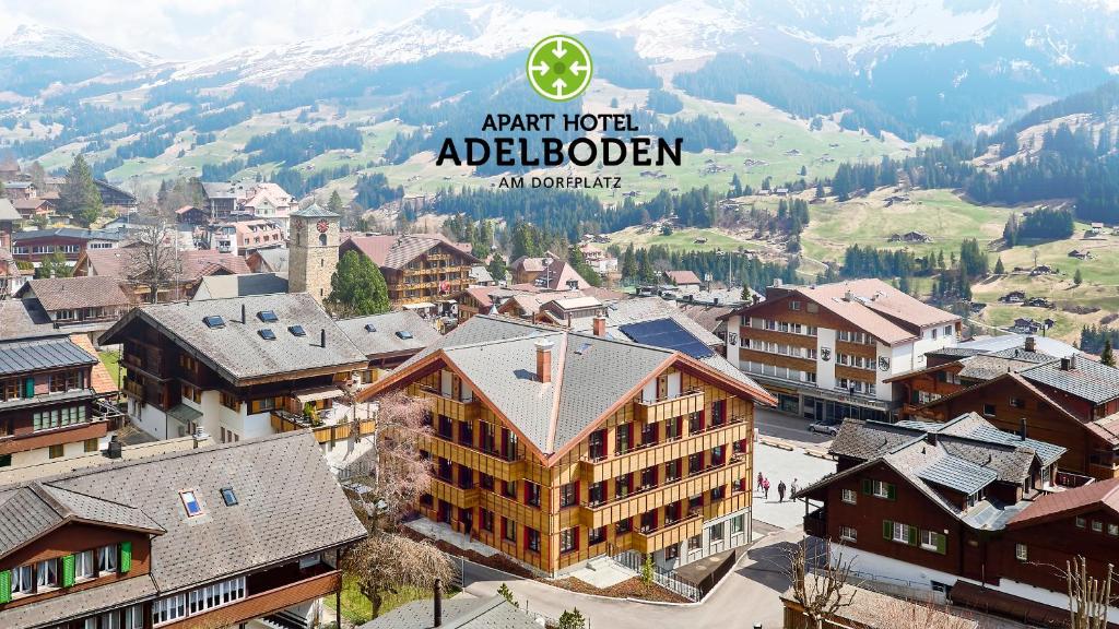 an aerial view of a town in the mountains at Apart Hotel Adelboden am Dorfplatz in Adelboden