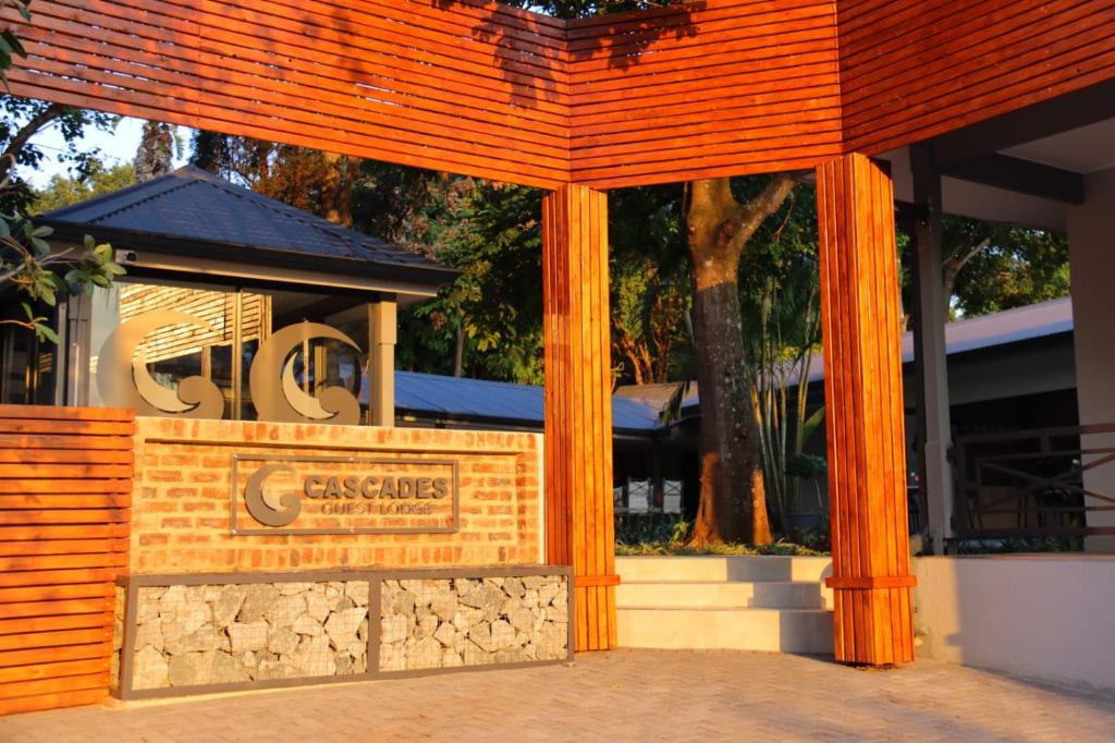 a sign for the entrance to a building at Cascades Guest Lodge in Nelspruit