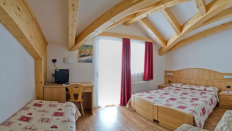 Postel nebo postele na pokoji v ubytování Hotel Miramonti