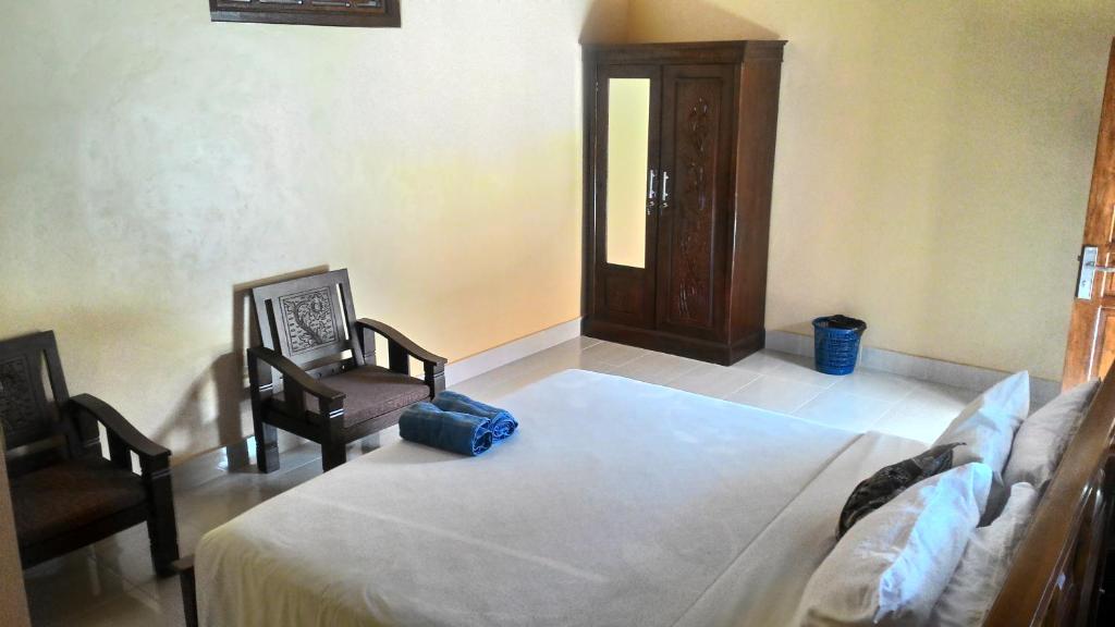 Postel nebo postele na pokoji v ubytování Muka House