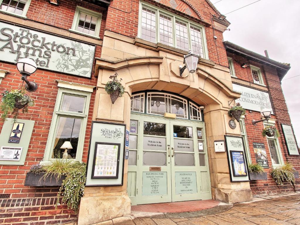 a brick building with a sign above the door at The Stockton Arms in Stockton-on-Tees
