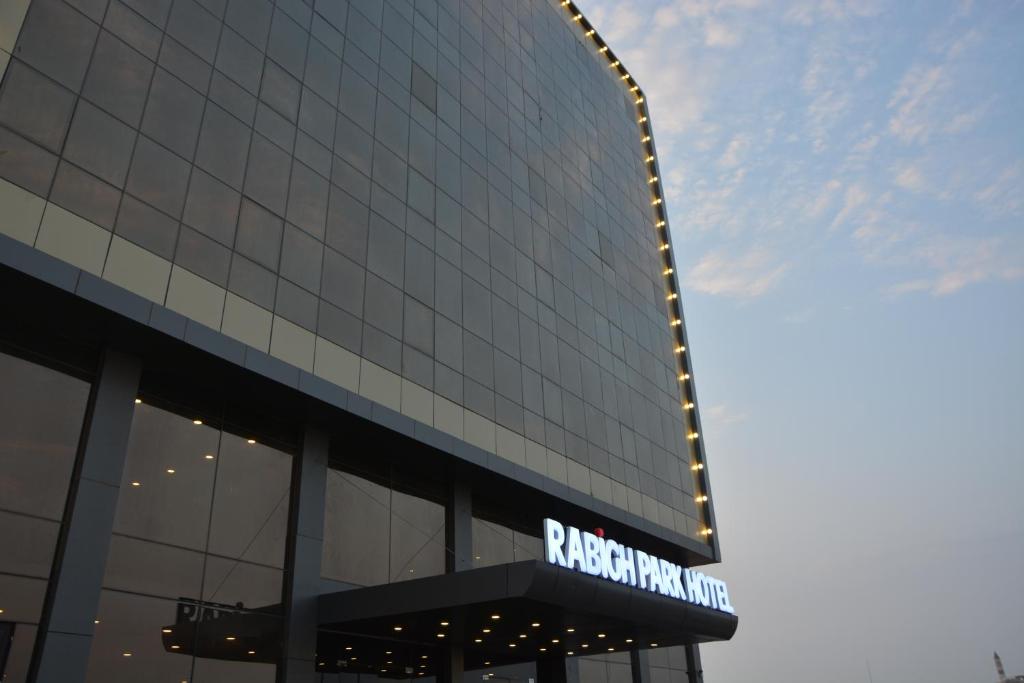 a building with a sign on the side of it at Rabigh Park Hotel in Rabigh