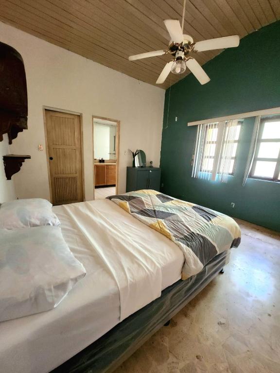 Llit o llits en una habitació de Encanto