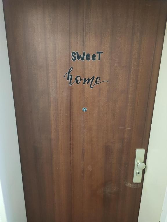 a door with the words sweet home written on it at Sweet Home in Hameln