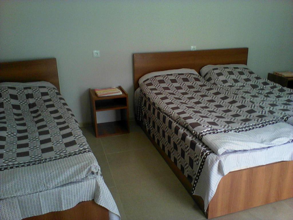 Postel nebo postele na pokoji v ubytování Mount Guest