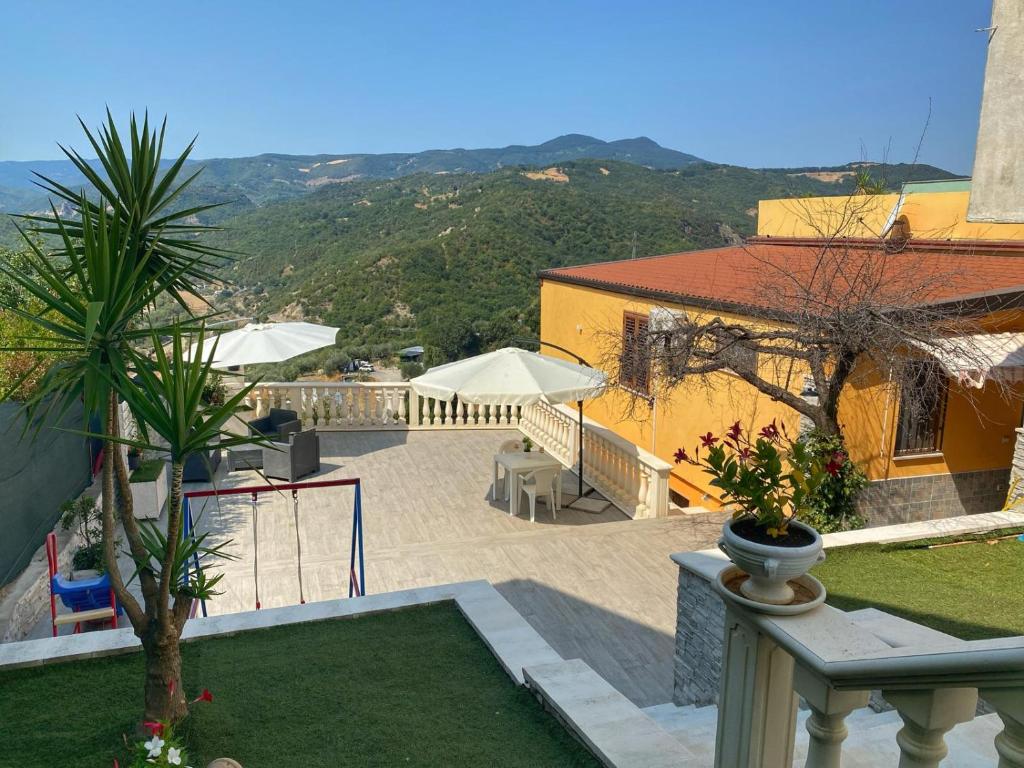 a view of a balcony of a house with a patio at Regina Claudia in Garaguso