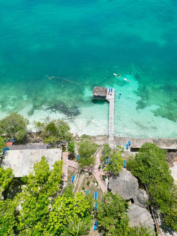 an aerial view of a lighthouse in the water at Ecohotel Nativa Beach in Cartagena de Indias