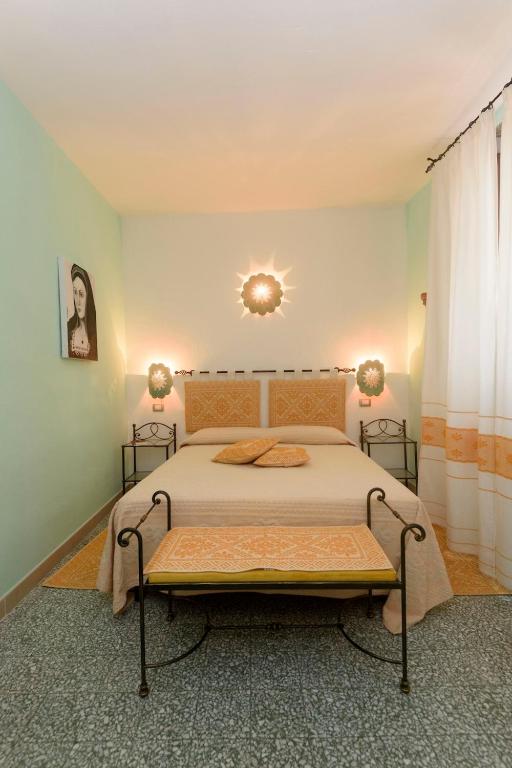 Postel nebo postele na pokoji v ubytování Al Vecchio Corso B&B