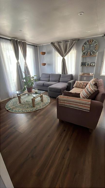 a living room with a couch and a table at Cabaña en Ancud in Ancud