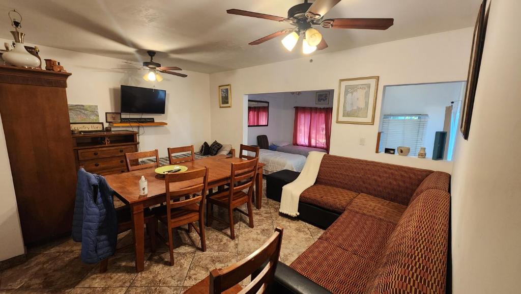 a living room with a couch and a table at Casa Vizcaino in Ensenada