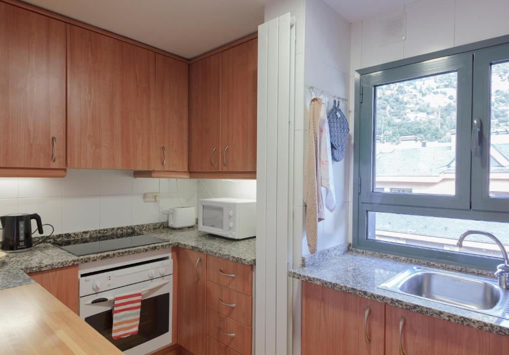 Kuchyň nebo kuchyňský kout v ubytování Outdoor Apartaments - Comfort