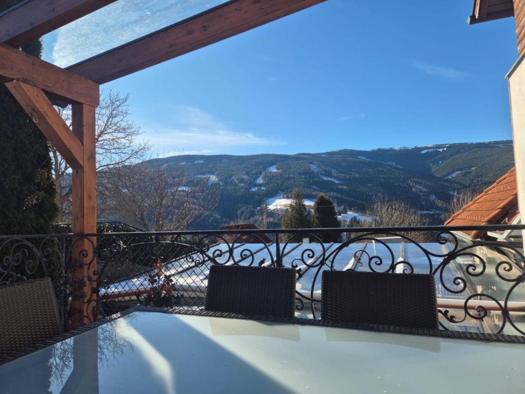 a balcony with a view of the mountains at Ferienwohnung Pölzlbauer in Neuwald