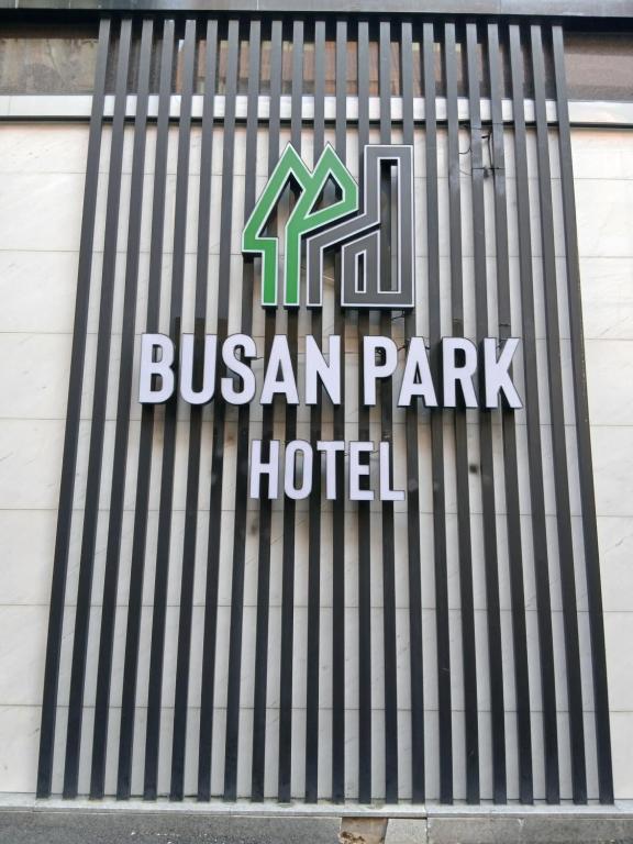 a sign for a boston park hotel on the side of a building at 부산파크호텔 in Busan