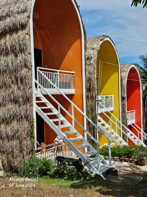 a house with a staircase in front of it at Alcasas Resort in Duero