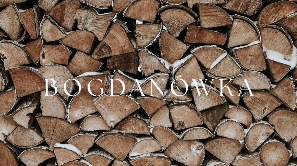 a close up of a wooden floor with the words boquetwood at Bogdanówka in Supraśl
