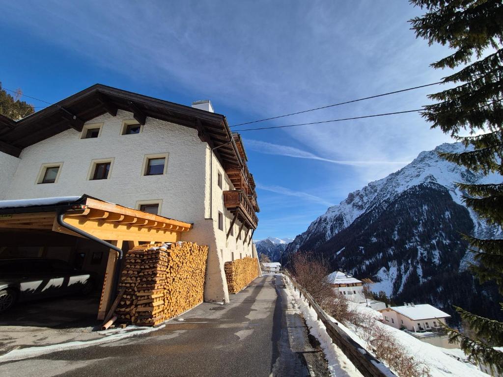 a building on the side of a mountain at Haus Gande in Spiss