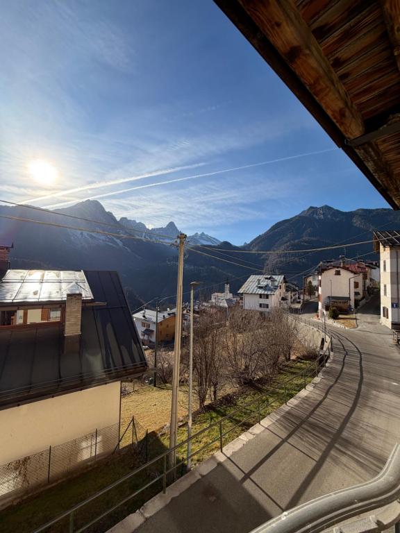 a view of a street with mountains in the background at Ciasa Caligher in Venas
