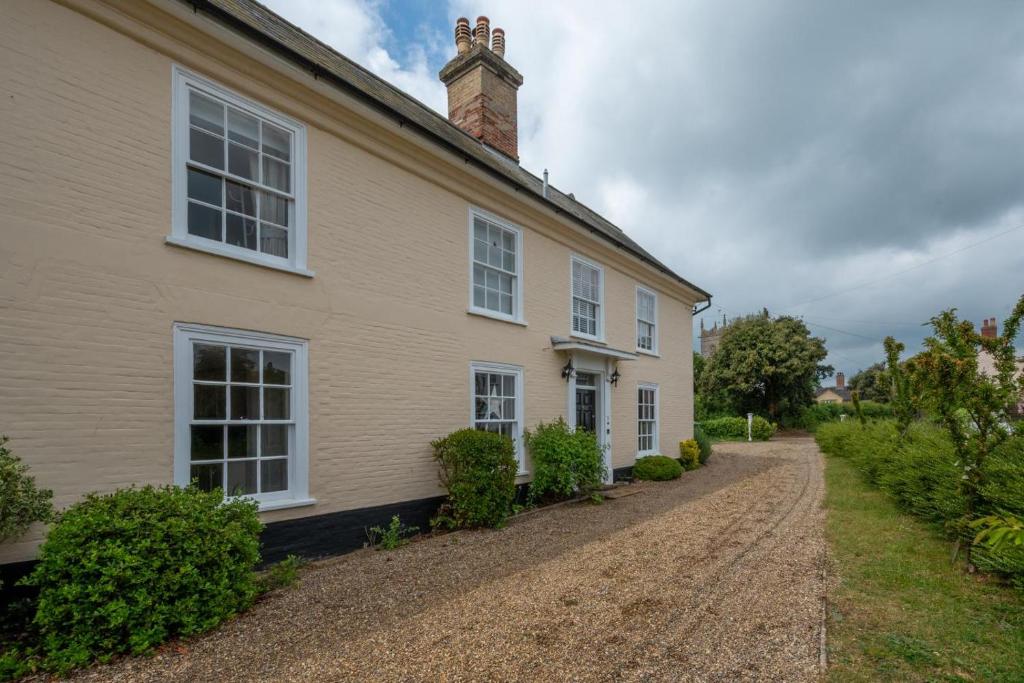 a house with a dirt road in front of it at 4 Bed in Wangford oc-2tov in Wangford