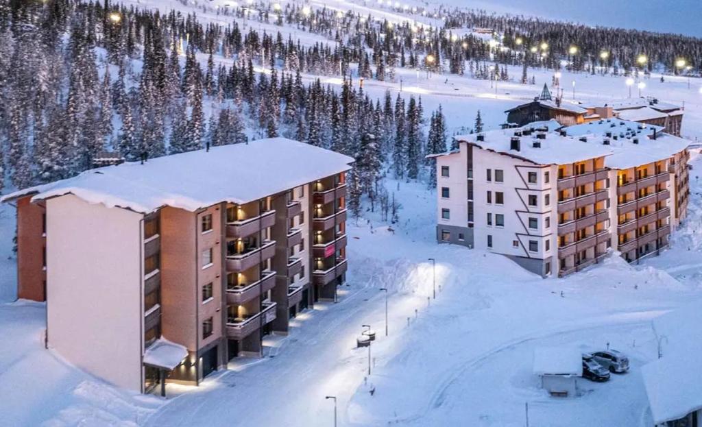 an aerial view of a resort in the snow at Ylläs Chalets IV 4309 in Ylläsjärvi