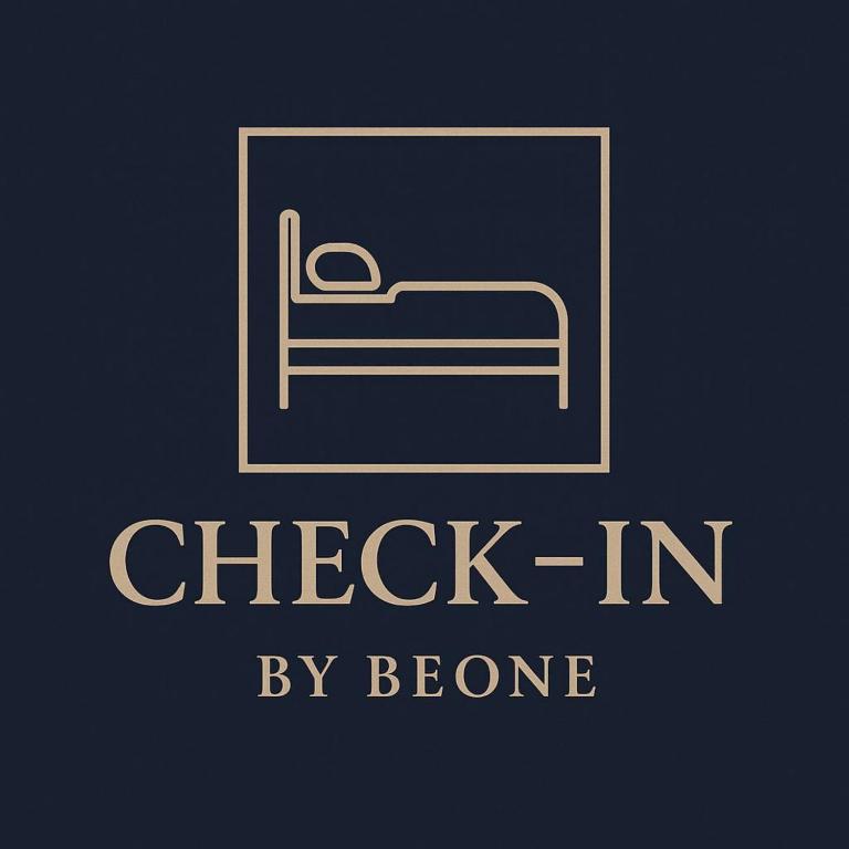 a logo for check in by bone with a bed at Check-In by BeOne RW-N in Rottweil