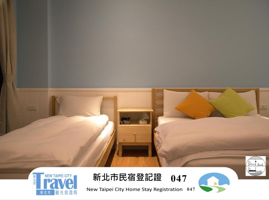 Llit o llits en una habitació de Liu House