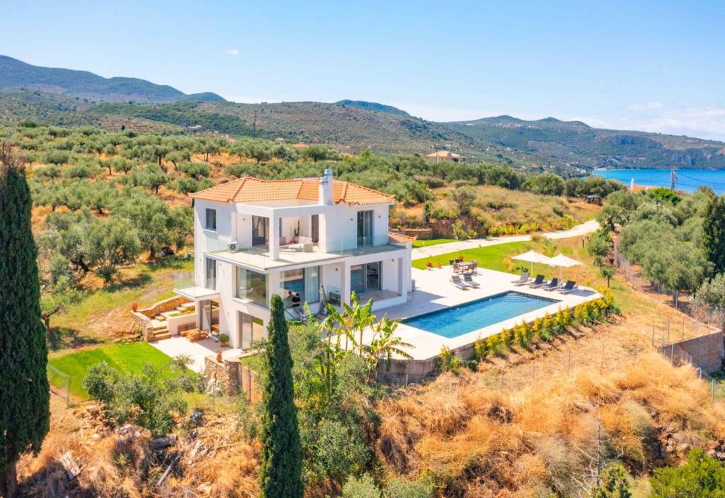 an aerial view of a villa with a swimming pool at Villa Sadova Private pool Panoramic view in Kalamata