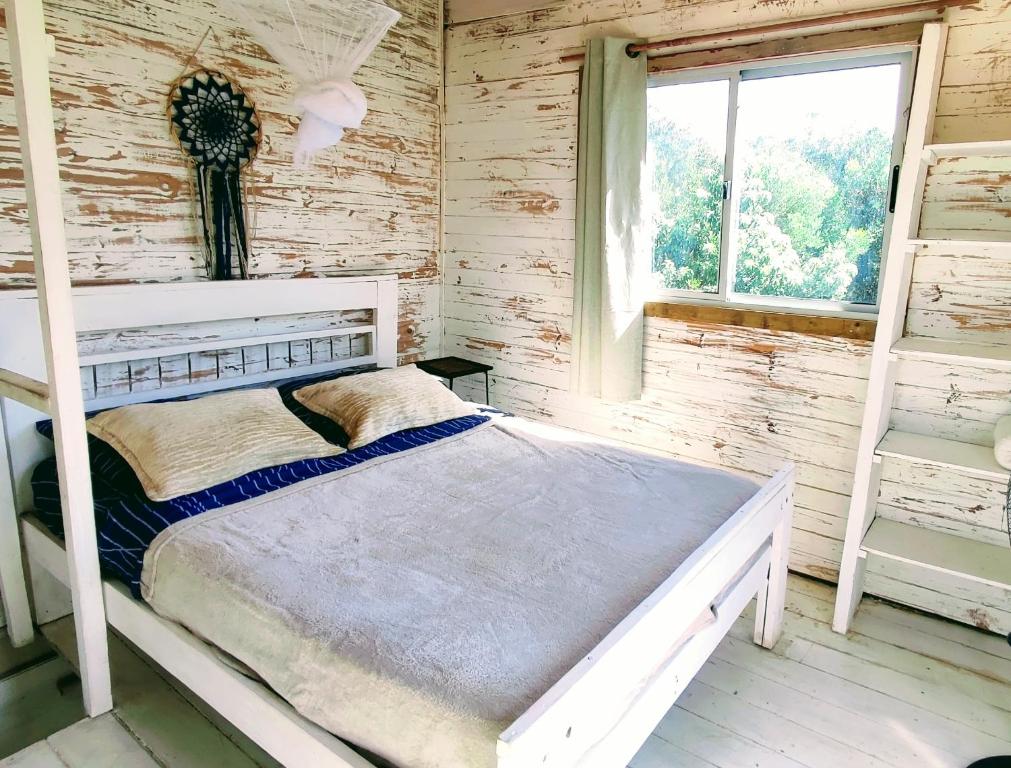 Postel nebo postele na pokoji v ubytování Casa Iris