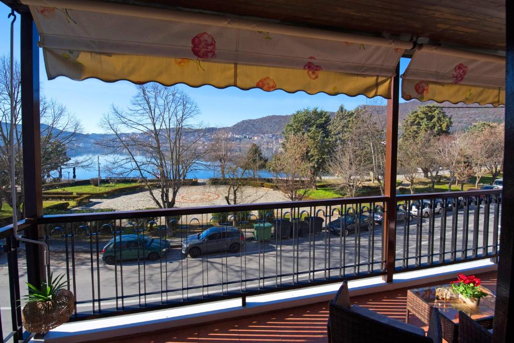 a view of a parking lot from a balcony at Alexandra Welcome Maxi Place in Kastoria