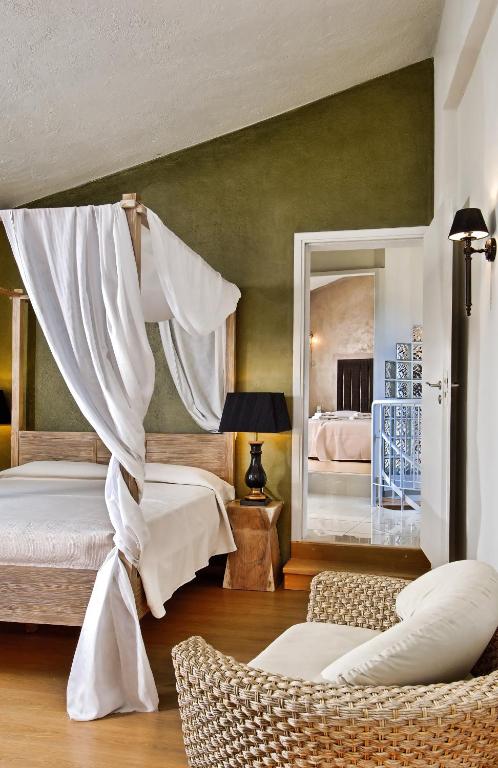Postel nebo postele na pokoji v ubytování Paradise Island Villas