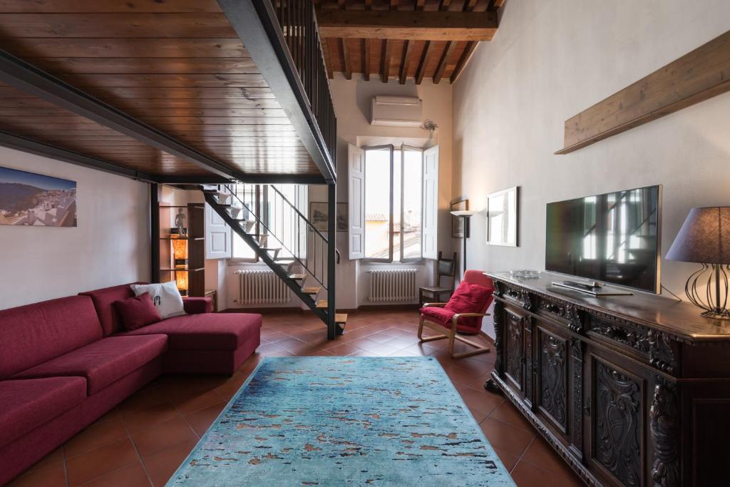 A seating area at Firenze Rentals Suite Proconsolo