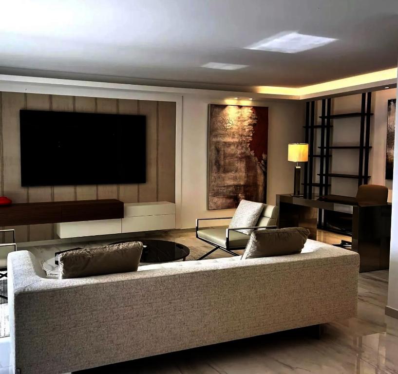 TV a/nebo společenská místnost v ubytování Sunshine Gold Spot