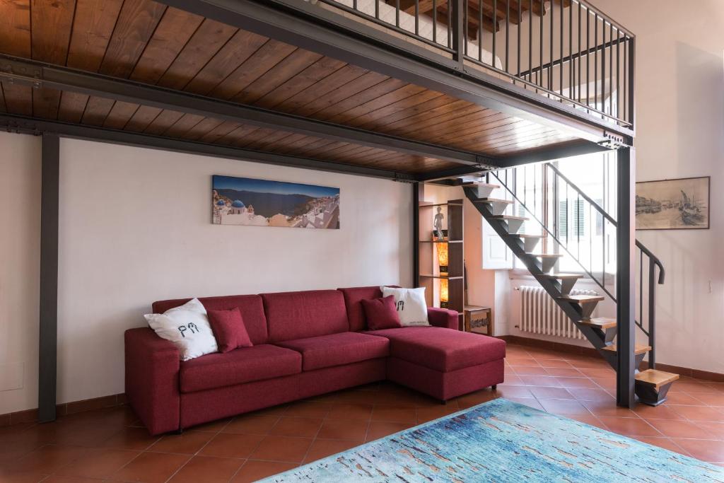 A seating area at Firenze Rentals Suite Proconsolo