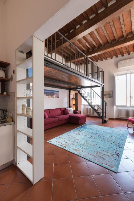 A bed or beds in a room at Firenze Rentals Suite Proconsolo