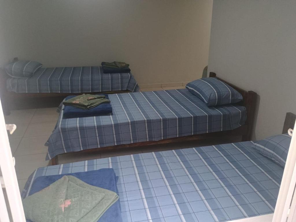 Llit o llits en una habitació de Microcasa pratica