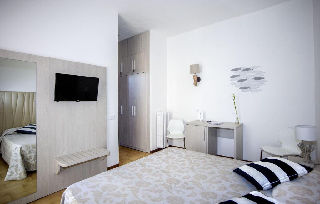 Posteľ alebo postele v izbe v ubytovaní Hotel Lucerna