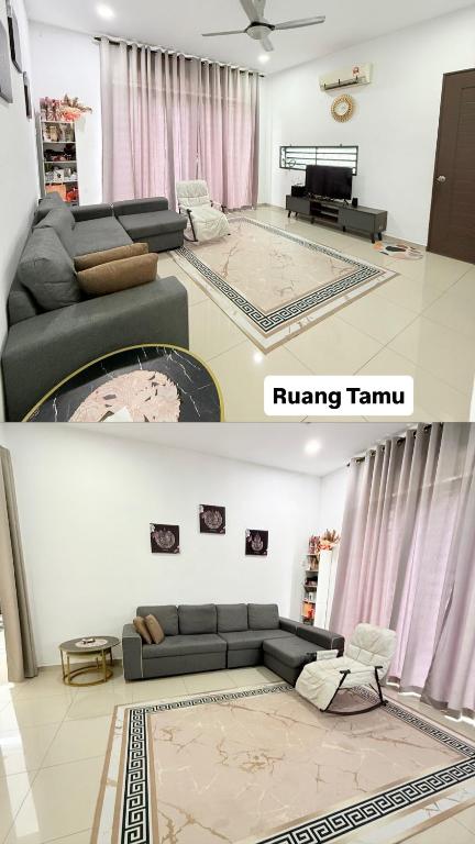 a living room with a black couch and aring tent at Eca's guest house in Temerloh