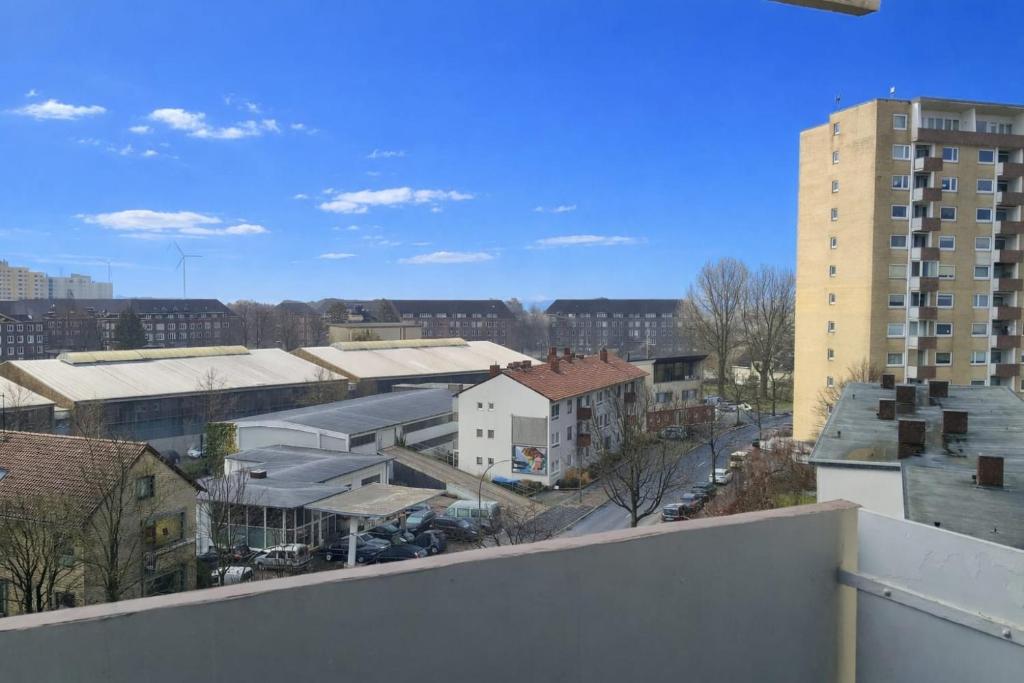 a view of a city from a balcony at FeWo Deichnest in Brhv -Mitte Monteure in Bremerhaven